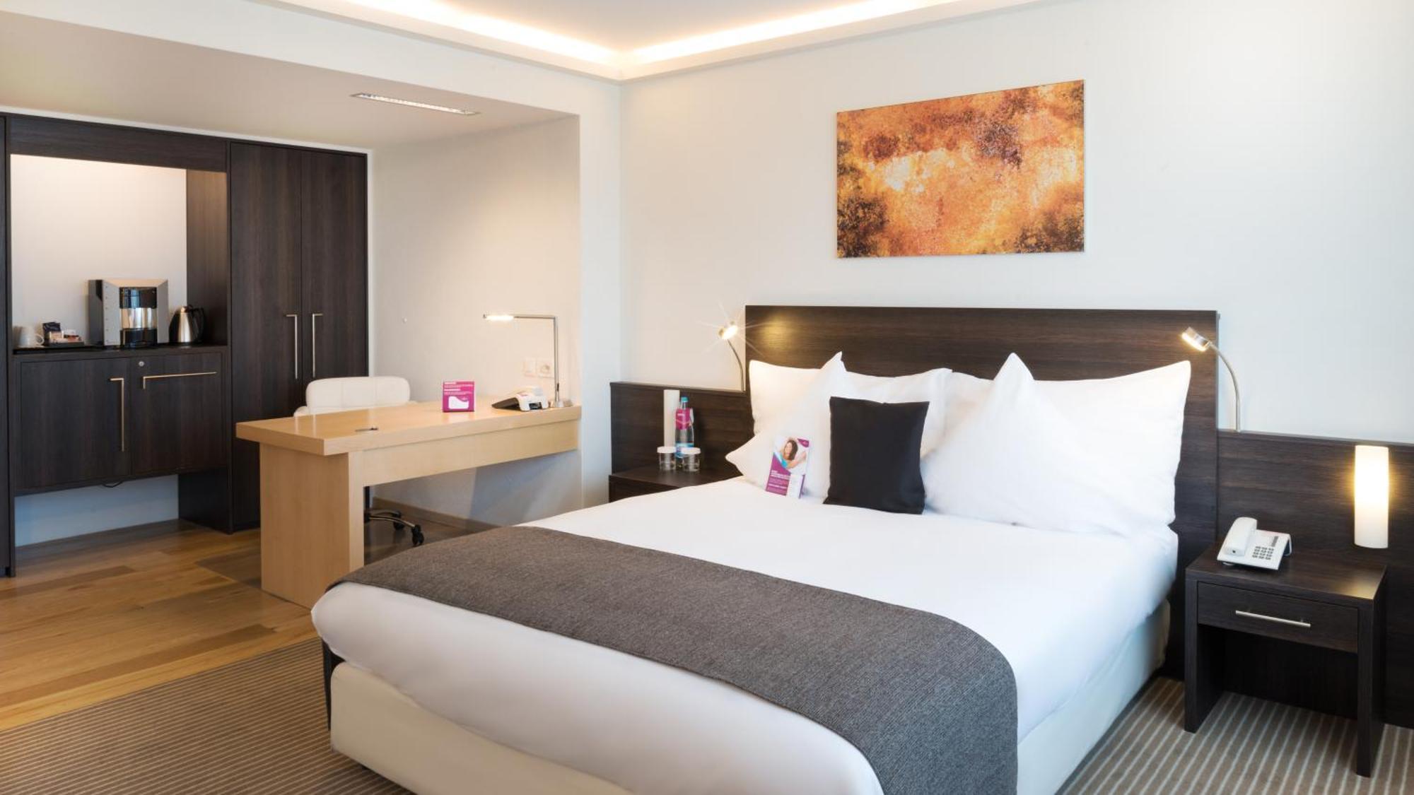 Suite Junior con cama grande y salón